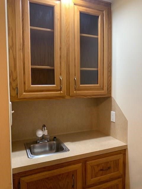1922 20th Street Huntsville, TX 77340 - Photo 9 of 49 a kitchen with a sink and cabinets