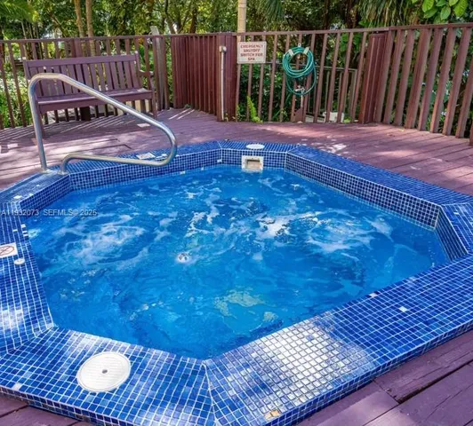 a view of a lake with tall building