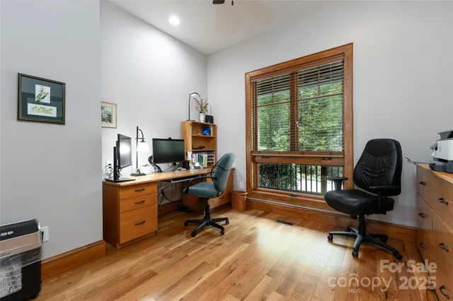 a bedroom with bed and window