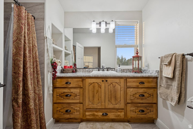 2925 Juniper Road Enterprise, UT 84725 - Photo 27 of 56 Full bath featuring vanity and a shower with shower curtain