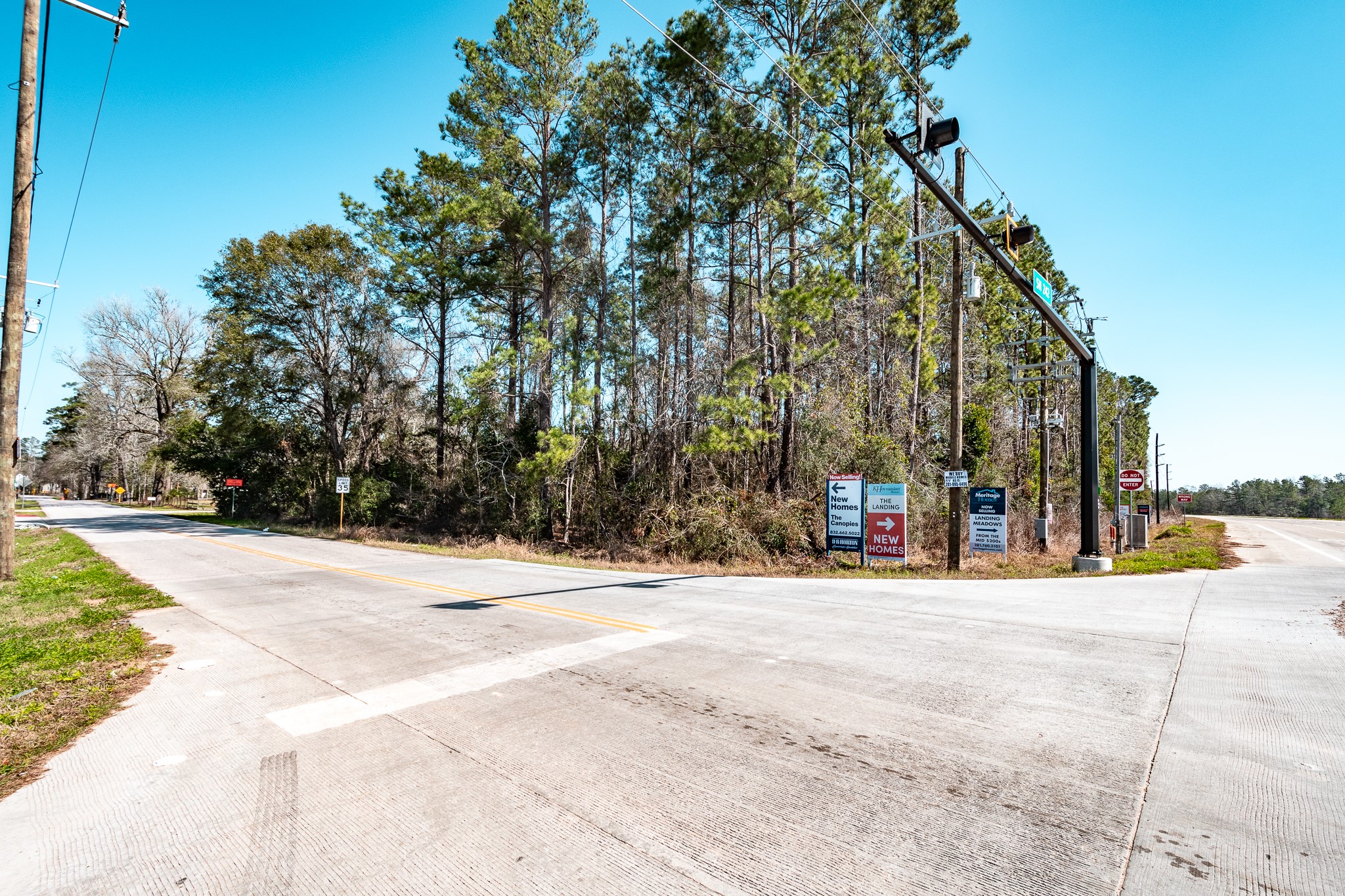 20201 Highway 242 Conroe, TX 77306 - Photo 5 of 10 a view of street along with trees