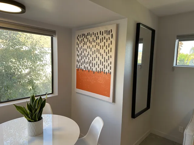 a view of a chair and table in a room