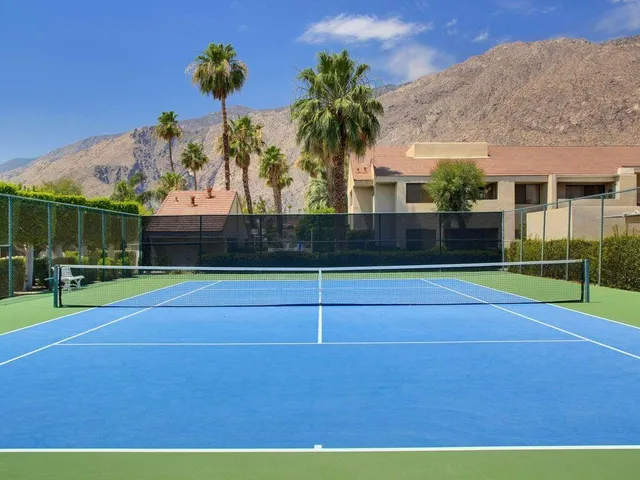 a view of outdoor space and basketball court