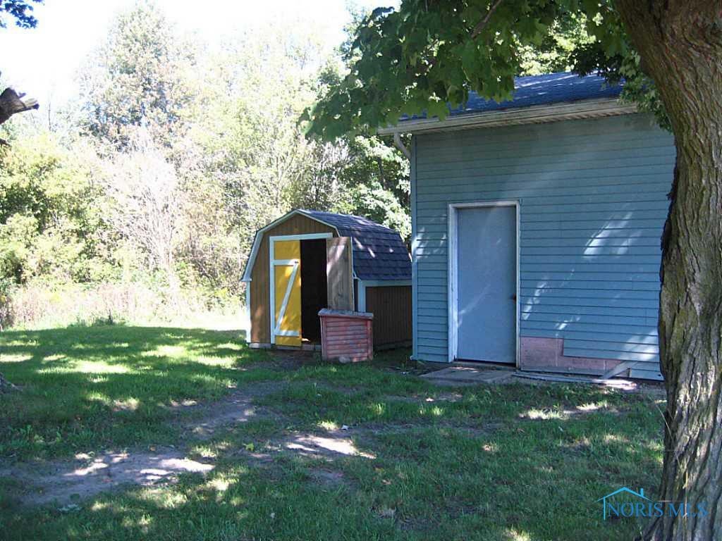 12358 C R1 Road, Unit COUNTY Edon, OH 43518 - Photo 4 of 20 Exterior Front. garageand shed
