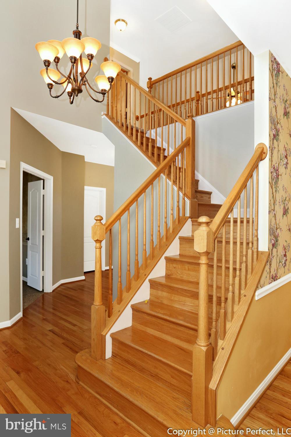 2557 Bear Den Road Frederick, MD 21701 - Photo 3 of 30 a view of entryway and hall with wooden floor