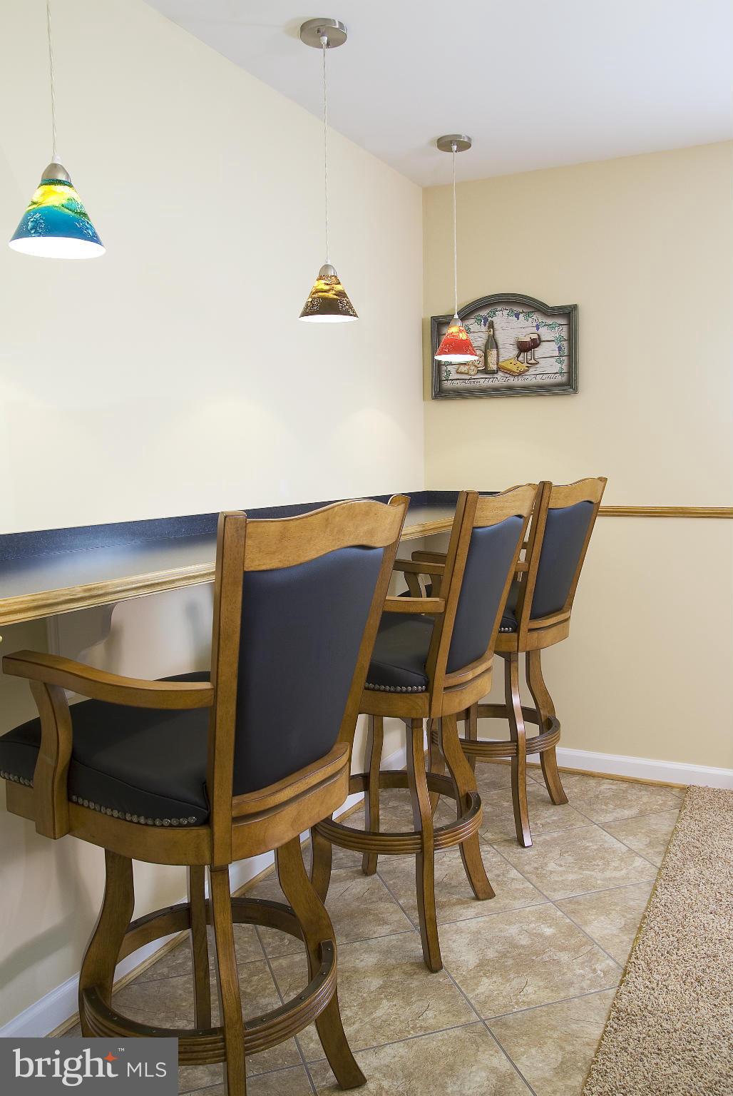 2557 Bear Den Road Frederick, MD 21701 - Photo 24 of 30 a view of a workspace and a table in a room