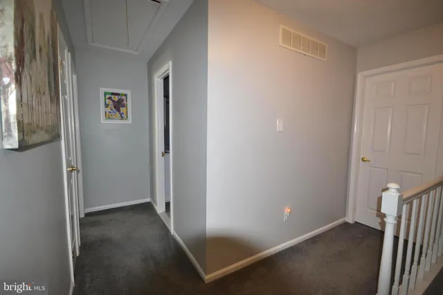 a view of a hallway with entryway