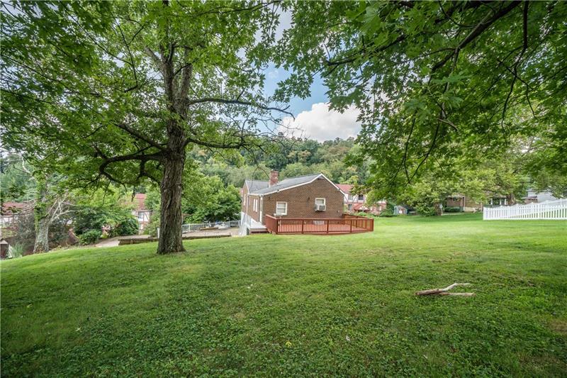 170 Churchill Road Turtle Creek, PA 15145 - Photo 24 of 25 Relax on the deck and enjoy this pretty yard.