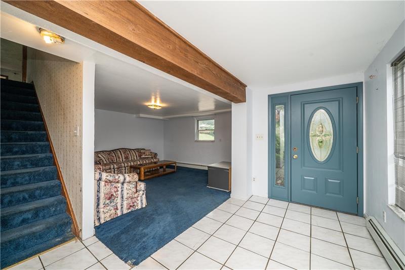 170 Churchill Road Turtle Creek, PA 15145 - Photo 4 of 25 Bright foyer opens to living room.