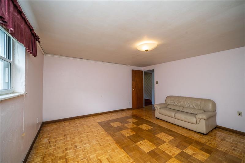 170 Churchill Road Turtle Creek, PA 15145 - Photo 7 of 25 Host the next big game in this huge family room.