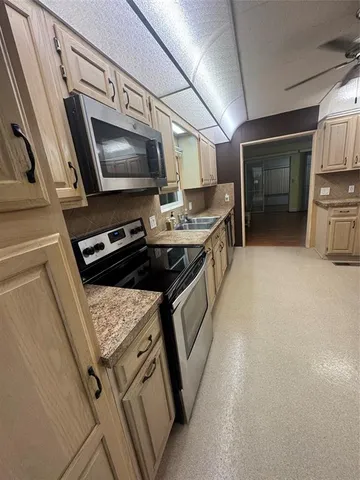 a utility room with cabinets