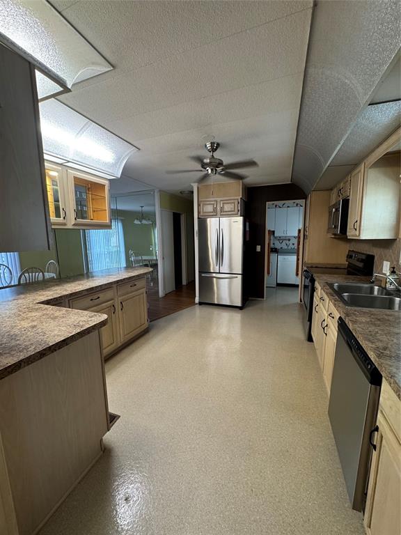 1921 Southwest 83rd Avenue Davie, FL 33324 - Photo 16 of 30 a view of a kitchen with granite countertop a sink and a stove top oven