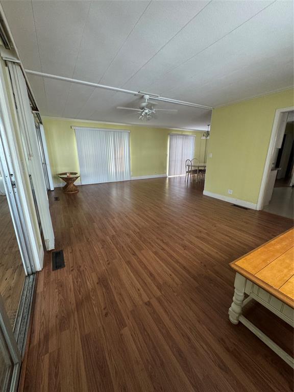 1921 Southwest 83rd Avenue Davie, FL 33324 - Photo 19 of 30 wooden floor in an empty room with a window