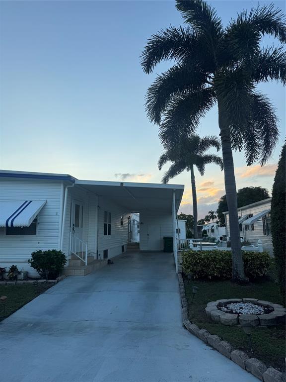 1921 Southwest 83rd Avenue Davie, FL 33324 - Photo 2 of 30 a view of a house with a patio