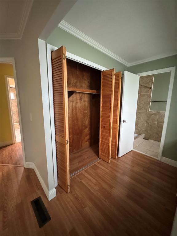 1921 Southwest 83rd Avenue Davie, FL 33324 - Photo 24 of 30 an empty room with wooden floor and windows