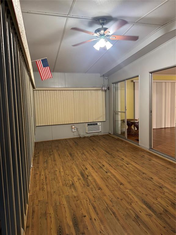 1921 Southwest 83rd Avenue Davie, FL 33324 - Photo 7 of 30 wooden floor in an empty room with a window