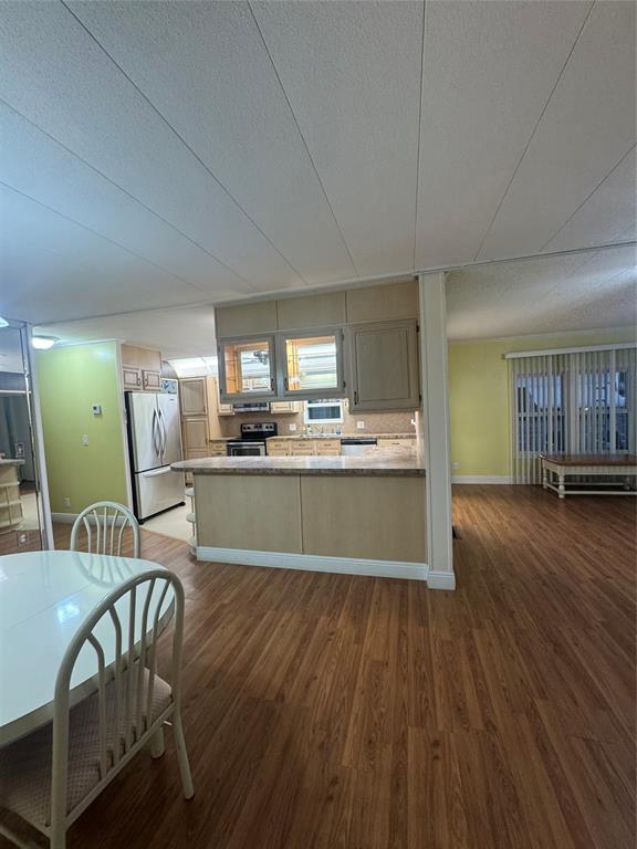 1921 Southwest 83rd Avenue Davie, FL 33324 - Photo 9 of 30 a view of kitchen with cabinets and wooden floor