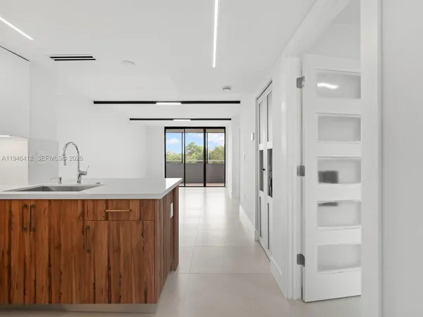 a bathroom with a sink and mirror