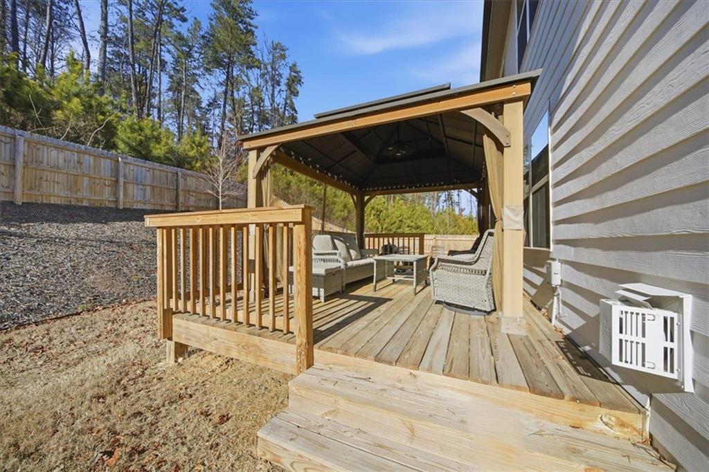 7946 Hansell Court Lithia Springs, GA 30122 - Photo 21 of 58 a view of deck with patio and wooden floor