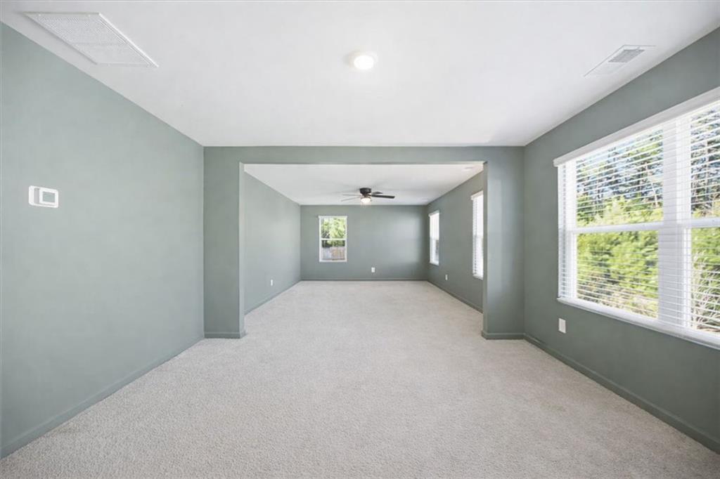 7946 Hansell Court Lithia Springs, GA 30122 - Photo 25 of 58 a view of an empty room with a window
