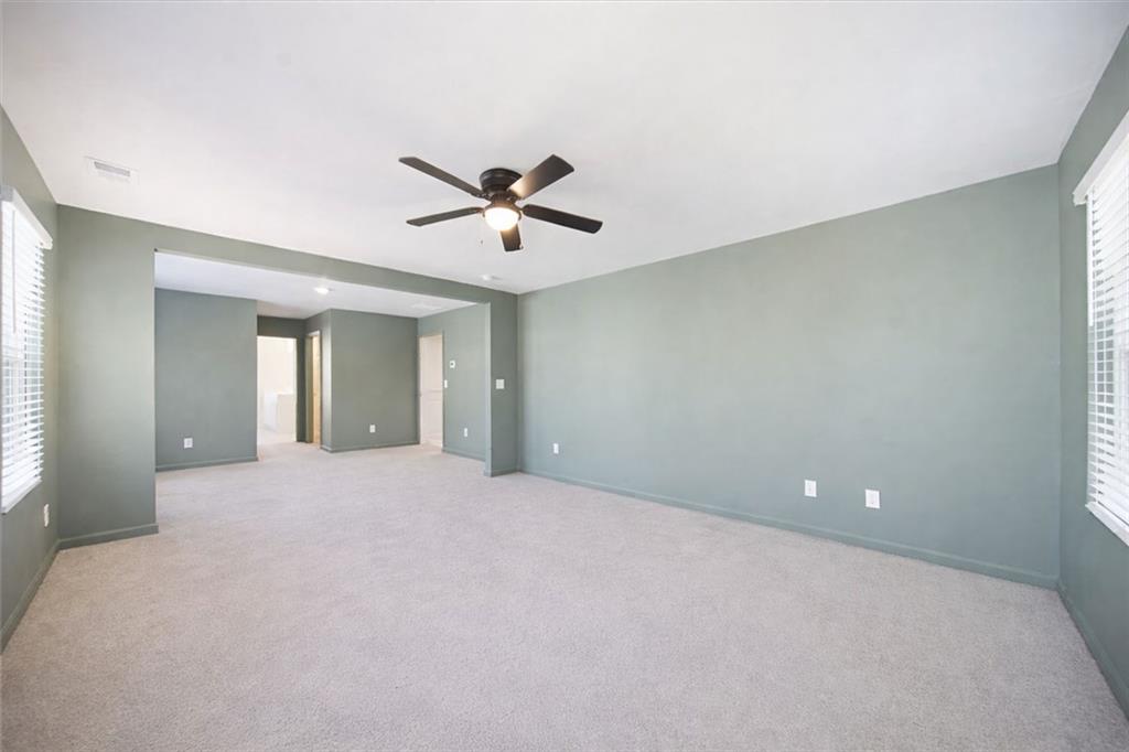 7946 Hansell Court Lithia Springs, GA 30122 - Photo 27 of 58 a view of an empty room with a window