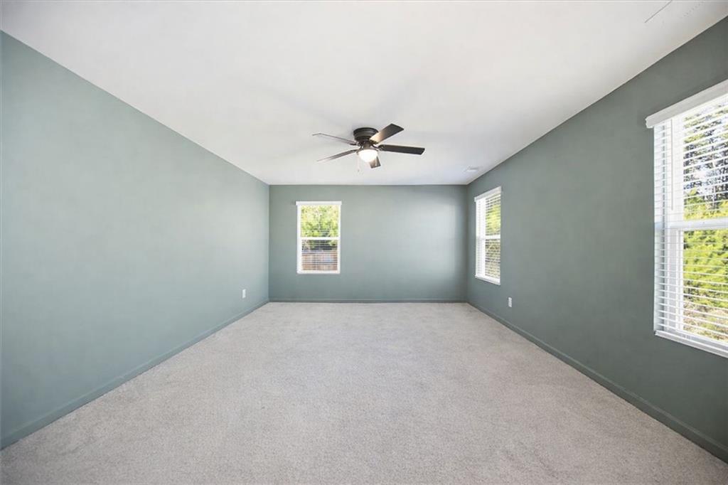 7946 Hansell Court Lithia Springs, GA 30122 - Photo 29 of 58 a view of an empty room with a window