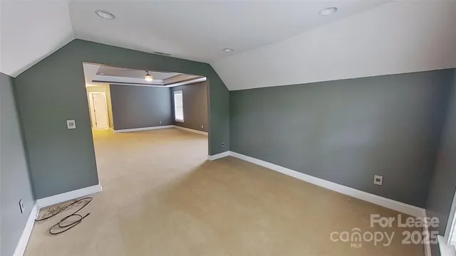 an empty room with mirror