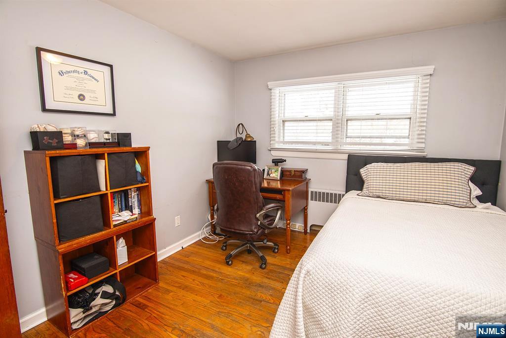 314 Valley Road Haworth, NJ 07641 - Photo 10 of 15 a bedroom with a workspace and a window