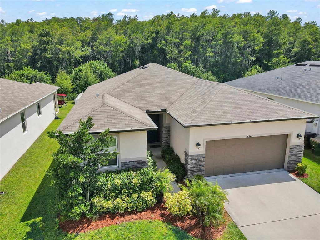 4548 Orchard Grove Road St. Cloud, FL 34772 - Photo 15 of 18 an aerial view of a house