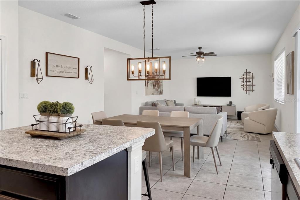 4548 Orchard Grove Road St. Cloud, FL 34772 - Photo 5 of 18 a view of a dining room with furniture