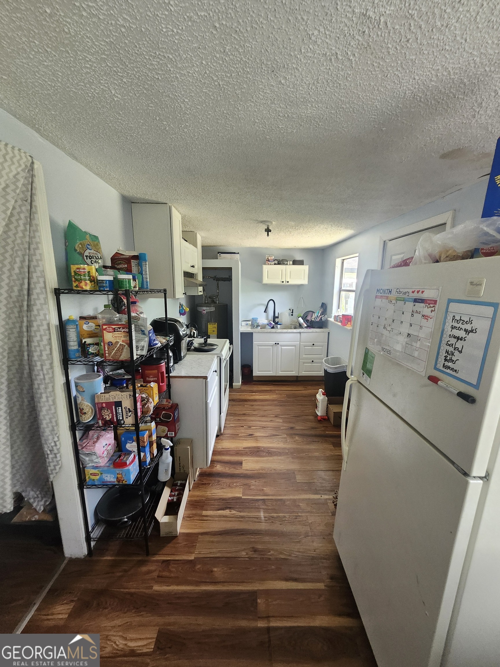 2101 South Madison Street Albany, GA 31701 - Photo 13 of 21 a room with furniture and a wooden floor