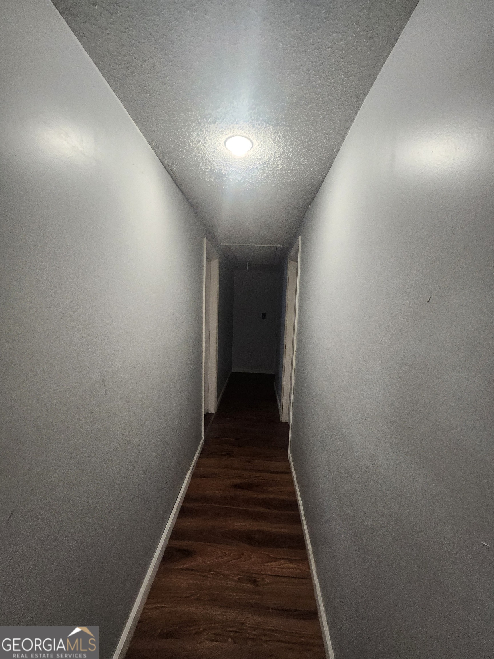 2101 South Madison Street Albany, GA 31701 - Photo 14 of 21 a view of a hallway with wooden floor and staircase
