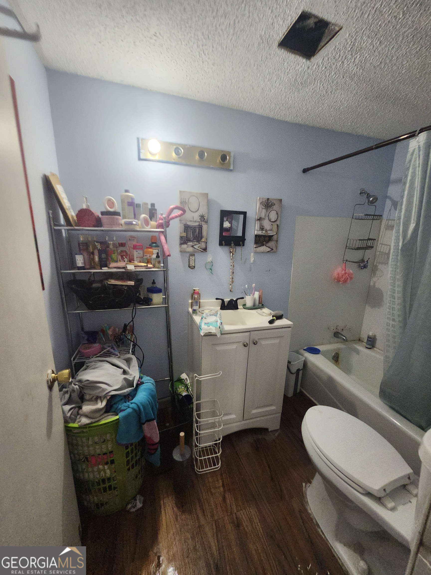2101 South Madison Street Albany, GA 31701 - Photo 19 of 21 a room with a storage and utility