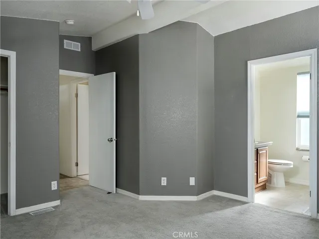 a view of a bathroom with toilet