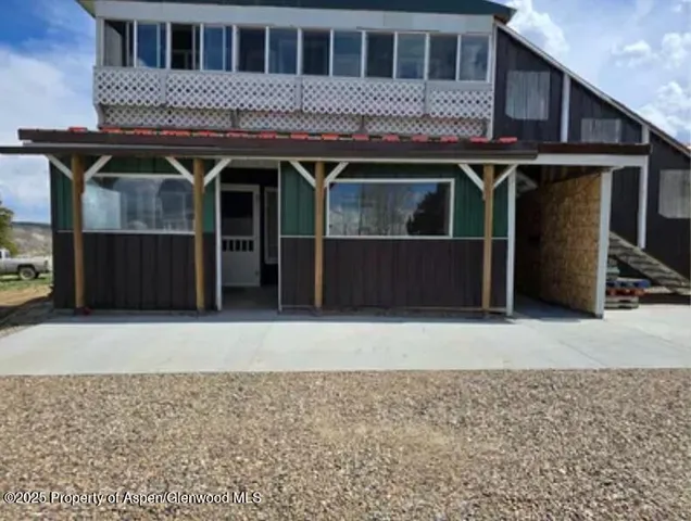 a front view of a stone house