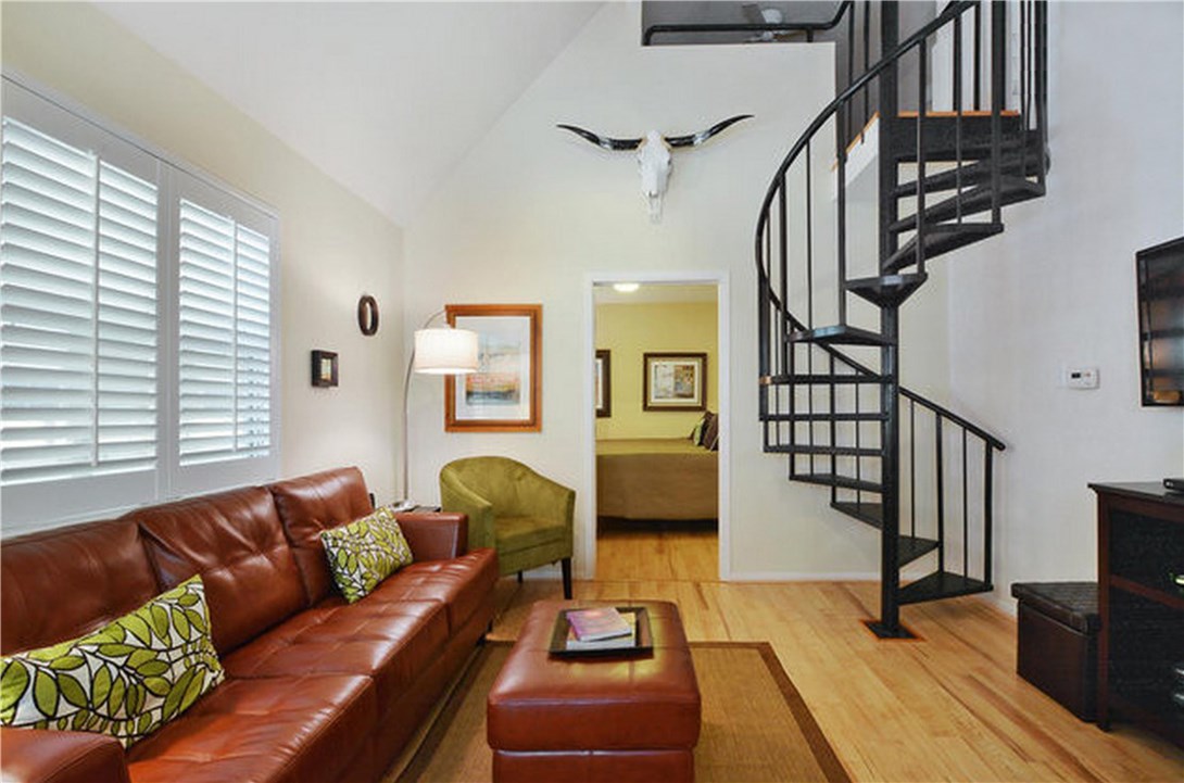 301 East 4th Street, Unit 333 Austin, TX 78701 - Photo 1 of 1 a living room with furniture and wooden floor