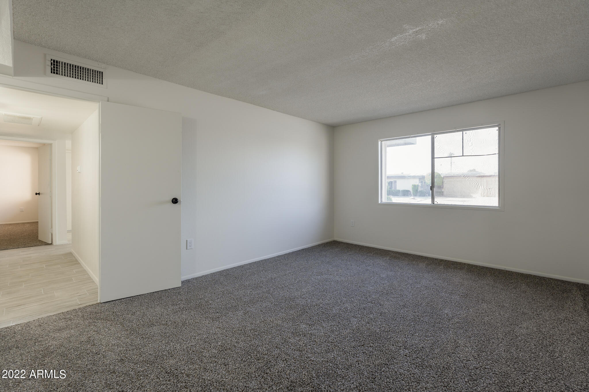 9833 West Royal Ridge Drive Sun City, AZ 85351 - Photo 13 of 20 Primary Suite