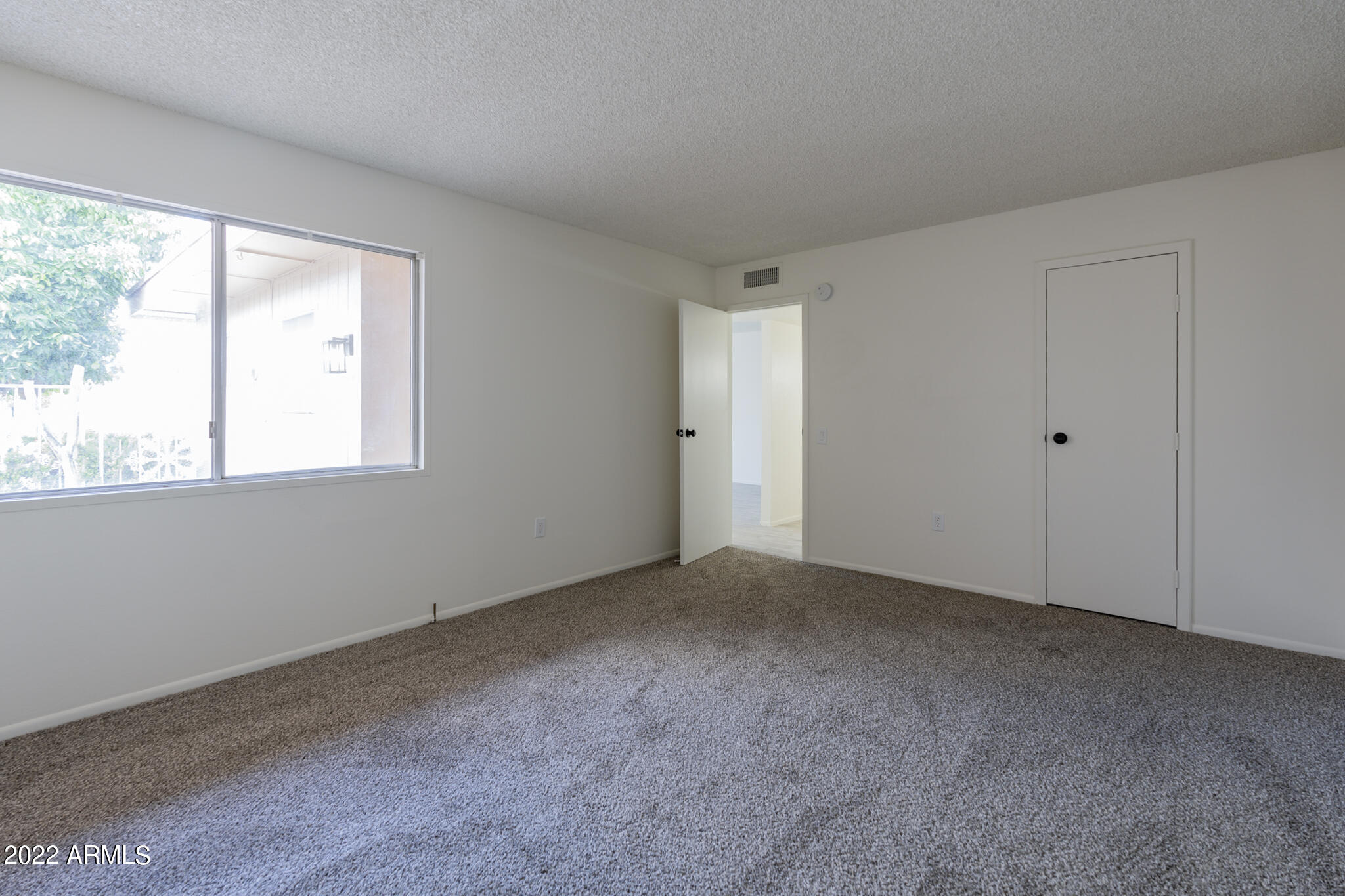 9833 West Royal Ridge Drive Sun City, AZ 85351 - Photo 17 of 20 Bedroom 2