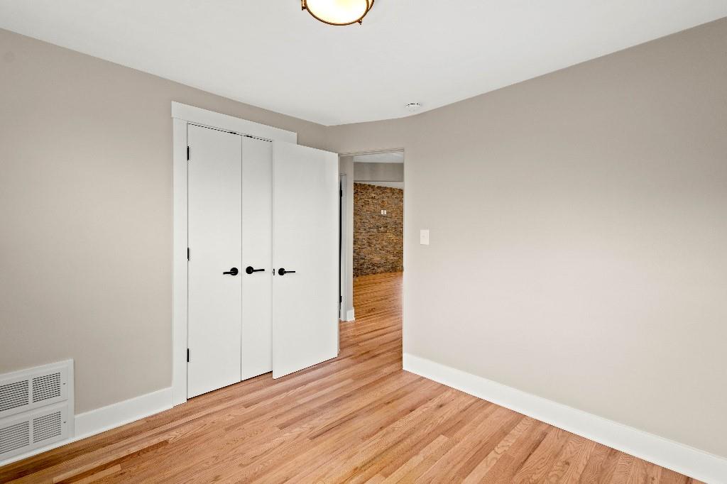 28 Seneca Road Pittsburgh, PA 15241 - Photo 14 of 24 a view of an empty room with wooden floor