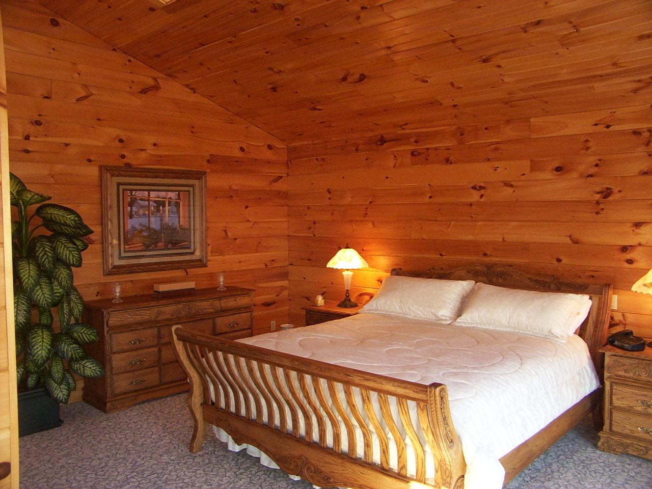 22-23 Crestview Road Blakeslee, PA 18610 - Photo 8 of 8 a bedroom with a bed and wooden floor