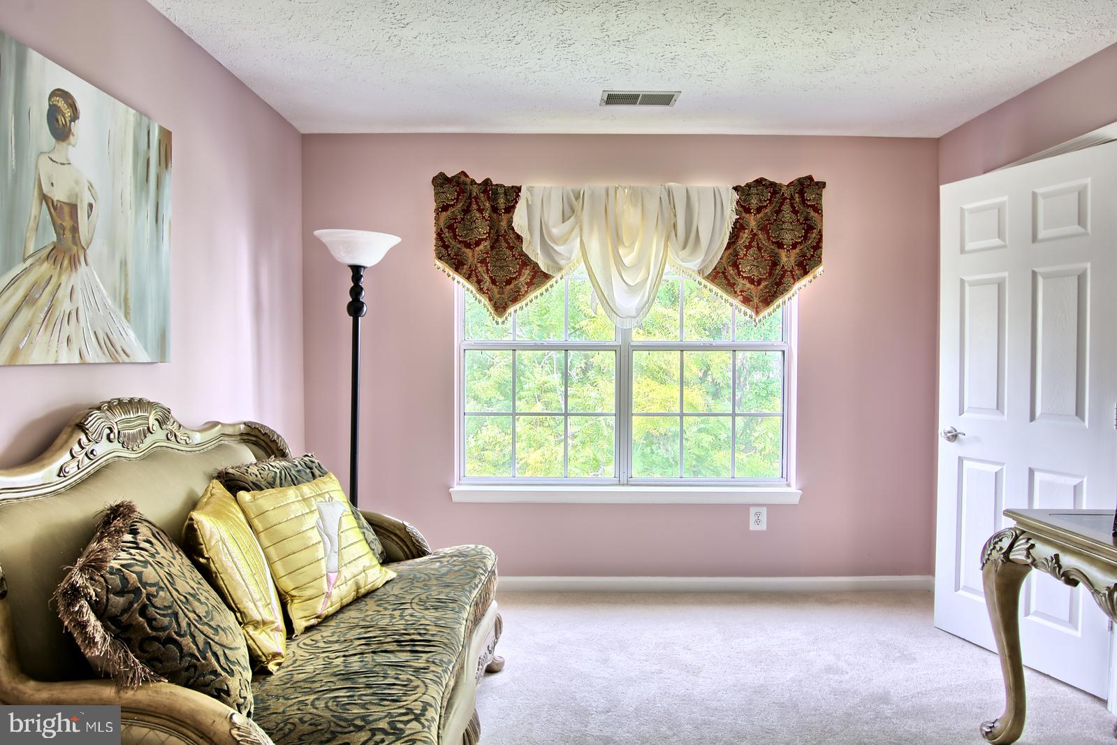 534 Kennington Road, Unit 534 Reisterstown, MD 21136 - Photo 15 of 19 a living room with furniture and a window