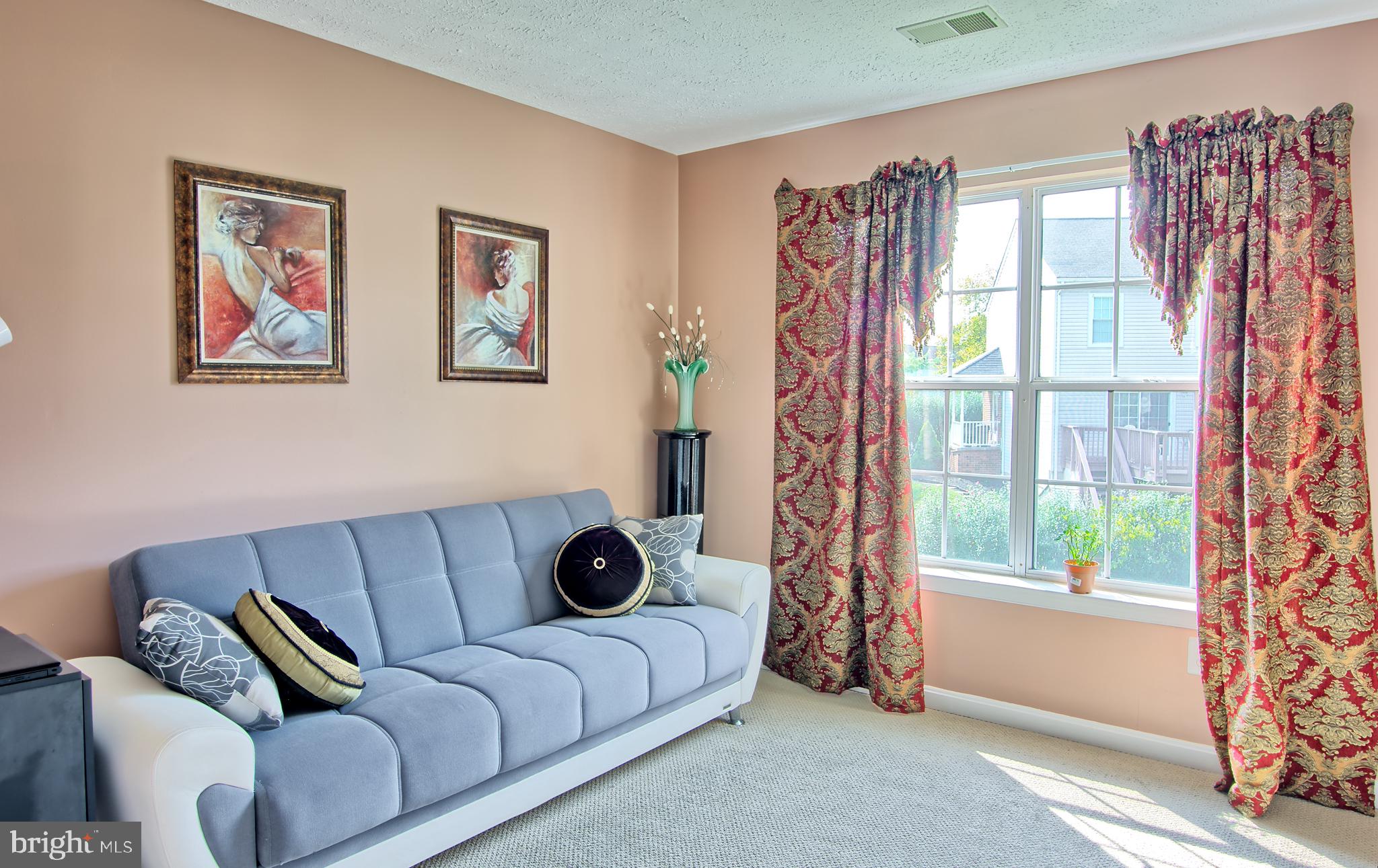 534 Kennington Road, Unit 534 Reisterstown, MD 21136 - Photo 16 of 19 a living room with furniture and a window