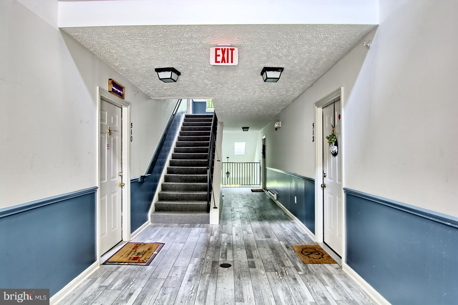 534 Kennington Road, Unit 534 Reisterstown, MD 21136 - Photo 2 of 19 a view of entryway and hall with wooden floor