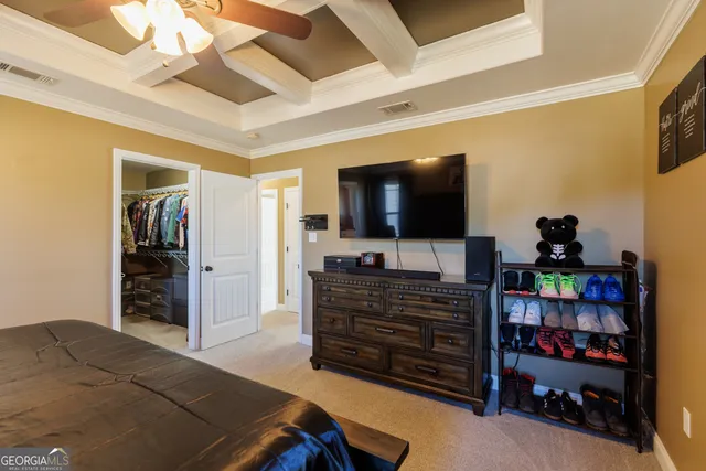 a room with furniture and a flat screen tv