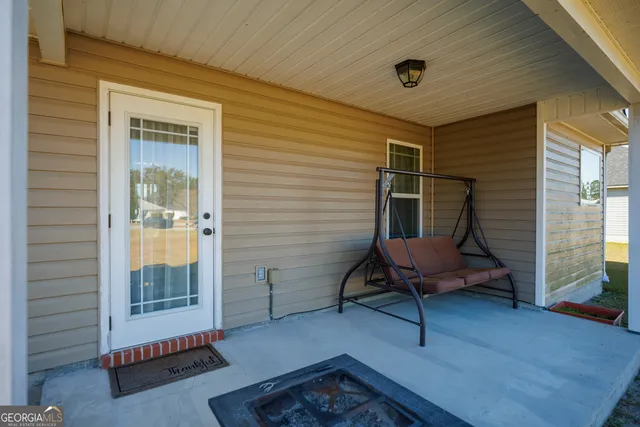 a backyard of a house with seating space