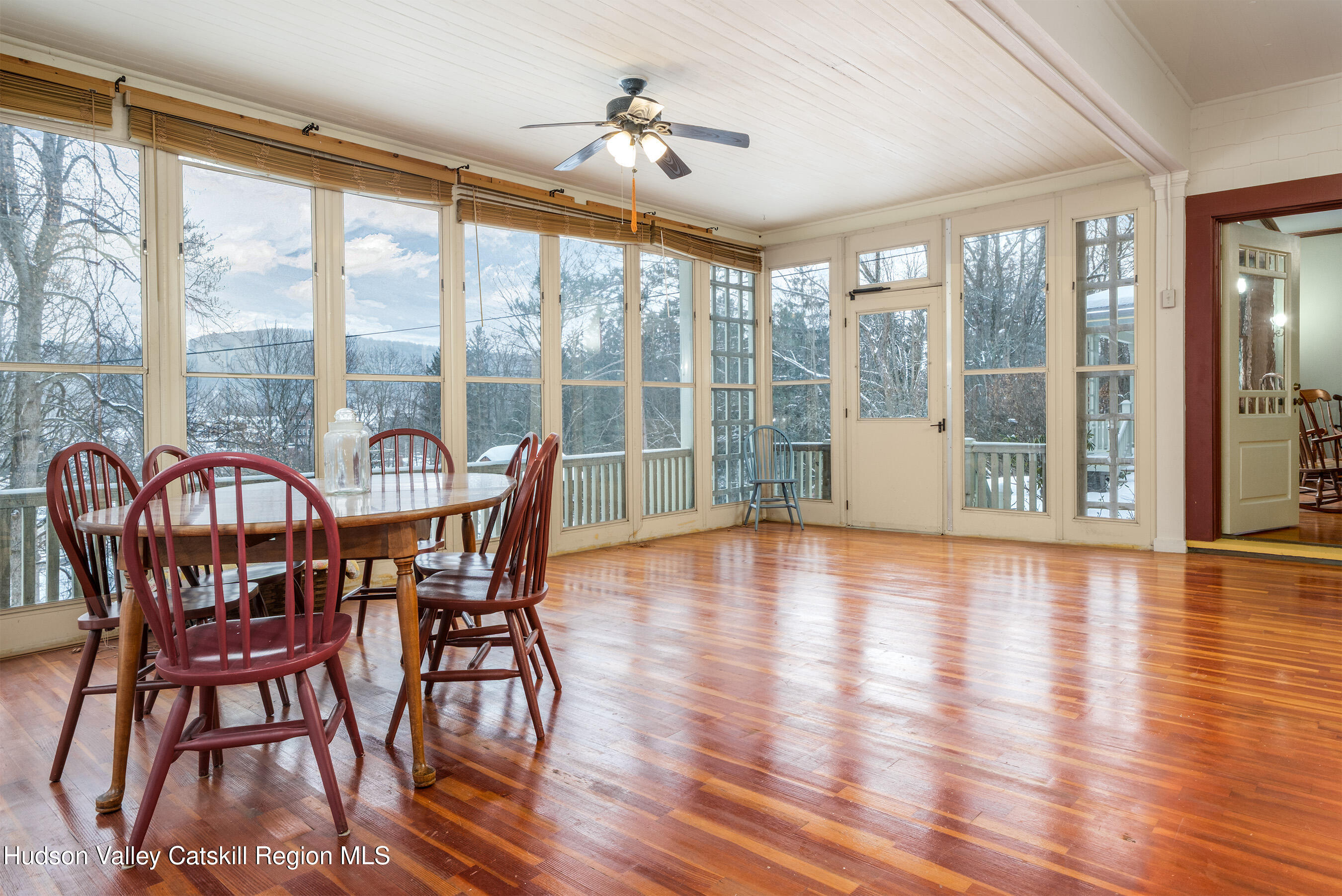 6 Westridge Road Cooperstown, NY 13326 - Photo 51 of 119 a view of a dining room with furniture window and wooden floor