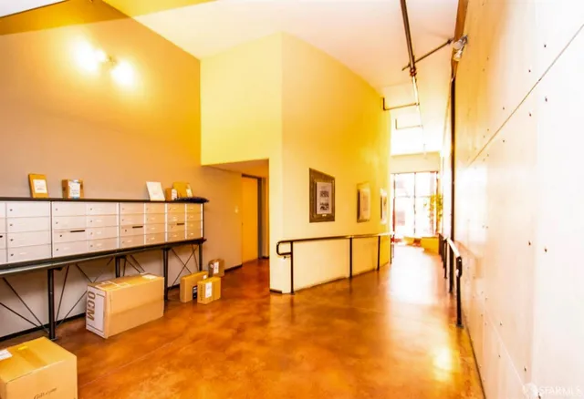 a view of a building with sitting area