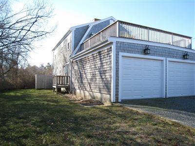70 Meridian Way Barnstable, MA 02630 - Photo 23 of 29 a backyard of a house