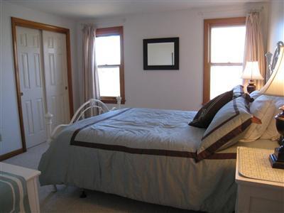 70 Meridian Way Barnstable, MA 02630 - Photo 10 of 29 a bedroom with a bed and a window