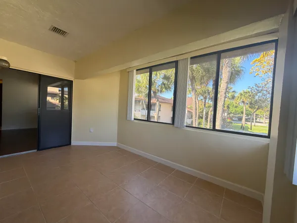 an empty room with windows